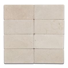 four white marble tiles arranged on top of each other, with one tile in the middle