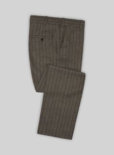 Embody an avant-garde fashion with our Caccioppoli Posa Dark Brown Wool Pants that perfect your splendid posture with pride. Tailored with pure wool, these pairs are cut from a cloth that has a texturized effect and a refined finish over a brown shade with a striped design that creates a swagger in formal dress codes. Also, with its comfort element, our pants shine with an upbeat attitude making your day easy and simple. So make a dapper change with this piece that will achieve individuality wit Elegant Wool Flat Front Bottoms, Elegant Wool Bottoms With Flat Front, Semi-formal Wool Pants For Winter, Wool Pants For Semi-formal Winter Occasions, Fitted Fall Suit Trousers, Luxury Fitted Dress Pants For Fall, Fitted Pants With Welt Pockets For Fall, Elegant Fitted Winter Dress Pants, Fitted Dress Pants For Semi-formal Winter Occasions