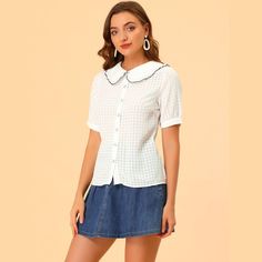 Simple and classic blouses are never out of date and maintain an elegant appearance. A very lovely and playful chiffon shirt with a peter pan collar, gingham patterns, the button front and a contrasting ruffled detail, allows people to have a sense of fashion in daily life. With the peter pan collar made with contrast edge, this textured shirt is unique and fashionable for daily wear. The sweet shirt features a peter pan collar with a ruffled trim and regular fit. Classic Blouses, Sweet Shirt, Women's Blouses, Button Up Blouse, Chiffon Shirt, Blouse Shirt, Pan Collar, Womens Clothing Sizes, Peter Pan Collar