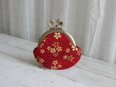 "Red Japanese Floral Design Coin Purse Wallet with Kiss Clasp The size of purse is about 4\"L x 3.5\"H The cards may not fit inside the purse" Red Vintage Clutch For Daily Use, Red Pouch With Card Slots For Daily Use, Red Pouch Wallets For Daily Use, Handmade Red Clutch As Gift, Handmade Red Clutch For Gift, Red Everyday Pouch Wallet, Compact Red Bags For Gifts, Handmade Red Clutch Perfect For Gift, Compact Red Wallet For Daily Use