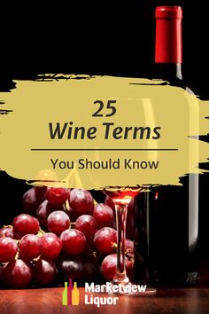 a bottle of wine and some grapes on a table with the words 25 wine items you should know