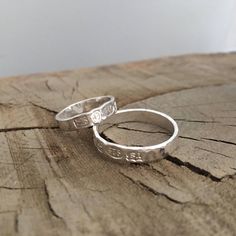 This beautiful simple band (similar to the hammered bangle) is gently hammered and then hallmarked on the outside. The hallmark shows the makers mark TS , 925, the Anchor ( Birmingham assay office) , and the Lion. Your choice of ring is uniquely crafted especially for you therefore I kindly ask you to please ensure you check your personal ring size prior to placing your order as exchanges or alterations are not accepted. I HAVE SOME SIZES IN STOCK READY TO GO IF YOU NEED ONE AT SHORT NOTICE - PL Hammered Sterling Silver Jewelry For Promise, Anniversary Hammered Open Band Stackable Rings, Hammered Sterling Silver Engraved Promise Ring, Sterling Silver Hammered Engraved Promise Ring, Hammered Sterling Silver Promise Ring, Hand Forged Sterling Silver Engraved Ring For Anniversary, Hammered Sterling Silver Round Band Ring, Simple Hammered Rings For Anniversary, Adjustable Hammered Anniversary Rings