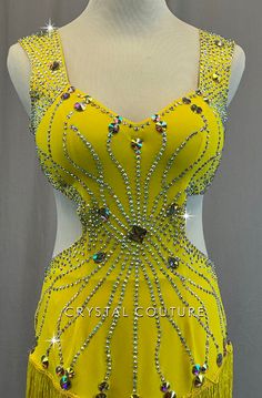 Custom Yellow dress has open back, side cutouts, and wide straps. Fringe along bottom hem and intricate rhinestoning. **Costume in image is an AS Photographed on an AS/AM Mannequin with Measurements of: Bust 35", Ribcage 30", Waist 25", Hip 34", Girth 57" ***18 Gross of Crystal AB 20ss, 30ss, and Sew On Shaped Rhinestones! Backless Evening Dress With Rhinestones, Sleeveless Rhinestone Dress For Pageants, Sleeveless Rhinestone Dress For Pageant, Fitted Sleeveless Evening Dress With Rhinestone Fringe, Dress With Side Cutouts, Baggy Clothing, Costumes For Sale, Crystal Ab, Sew On