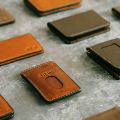 Our handmade men’s money clip is the perfect solution for those who want a simple wallet that isn’t too bulky, but is robust enough to hold everything you need— cash included. Featuring two front pockets with integrated thumb slot, a hidden rear pocket for those “always need but rarely use” insurance cards and the like, and the strongest magnets we were able to fit into a wallet of this size. Handcrafted to complement a guy of any age. Premium Horween full-grain leather and robust stitching for Rectangular Wallet With Interior Card Slots For Everyday, Everyday Trifold Wallet With Hidden Phone Sleeve, Everyday Rectangular Wallet With Interior Card Slots, Rectangular Wallets With Card Slots For Everyday, Everyday Rectangular Wallets With Id Window, Everyday Rectangular Wallet With Id Window, Rfid Blocking Rectangular Wallet For Everyday Carry, Rfid Blocking Rectangular Trifold Wallet, Rfid Blocking Everyday Rectangular Wallet