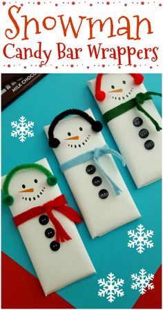 three snowman candy bar wrappers on a table