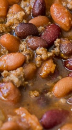 a close up view of some beans and meat