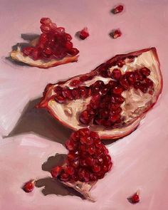 an oil painting of pomegranates on a pink surface with one cut in half