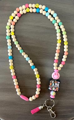 Start the school year with a new Eras Tour inspired Lanyard. Available in Teacher and Paraprofessional Era designs. Accent bead is customizable. All lanyards are 38 to 39 inches with breakaway clasps. Teacher Lanyard Ideas, Diy Teacher Lanyard, Teacher Lanyard Beaded, Teacher Lanyards, Cup Charms, Teacher Fits, Diy Lanyard, Teacher Accessories, Teachers Diy