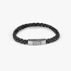 Black-coloured Italian leather strands are delicately woven together to create a textural braid and finished in a black rhodium plated sterling silver clasp, meticulously engineered in our Italian workshop. To open, simply push and hold the centre of the clasp to release the catch mechanism. Add your personal messages with our engraving service. Contact our Sloane Square boutique for further information. Mens Designer Jewelry, Sloane Square, Wrist Accessories, The Catch, Braided Leather Bracelet, Stackable Bracelets, Blue Gifts, Navy Leather, Black Rhodium