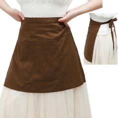 a woman wearing a brown and white skirt