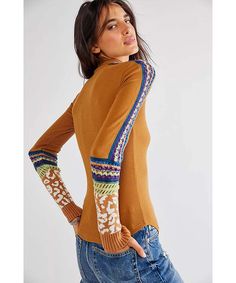 Boho thermal top featuring a colorful stripe pattern down the sleeves and printed cuffs. Slim silhouette Ribbed cuffs Care/Import Hand Wash Cold Import Measurements for size small Sleeve Length: 25.25 in Bust: 26.5 in Length: 25 in Contents: 38% Polyester 5% Elastane 57% Cotton Trim: 75% Cotton,19% Acylic,5% Nylon,1% Elastane Brown Stretch Top With Ribbed Cuffs, Crew Neck Top With Striped Cuffs For Winter, Spring Multicolor Tops With Ribbed Cuffs, Fitted Brown Top With Ribbed Cuffs, Brown Fitted Top With Ribbed Cuffs, Fitted Brown Tops With Ribbed Cuffs, Striped Fitted Top With Ribbed Cuffs, Fitted Striped Top With Ribbed Cuffs, Fitted Striped Tops With Ribbed Cuffs