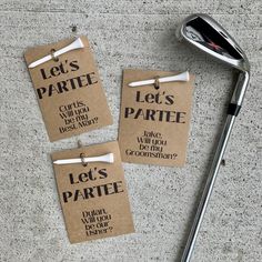 two pieces of brown paper with words on them and a golf club next to it