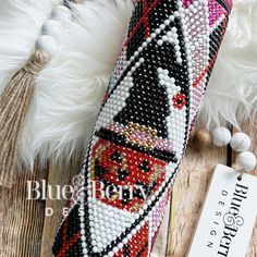 the beaded case is decorated with beads