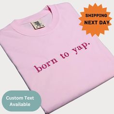 DESCRIPTION Born to Yap Embroidered T-Shirt - Funny Gifts for Her, Girly Hoodie, Y2K Meme Shirt, Customized Sweatshirt Gift This playful and bold Born to Yap Embroidered T-Shirt is the perfect addition to any girl's wardrobe who isn't afraid to show off her personality! Whether you're known for your chatty nature, your love of humor, or just need a cute yet sassy piece to brighten up your day, this shirt has got you covered. With its quirky slogan, comfortable fit, and Y2K-inspired design, it's Funny Pink T-shirt For Streetwear, Funny Pink Streetwear T-shirt, Pink T-shirt With Embroidered Graphics For Streetwear, Pink Cotton T-shirt With Embroidered Graphics, Pink T-shirt With Embroidered Graphics And Relaxed Fit, Pink T-shirt With Embroidered Graphics In Relaxed Fit, Trendy Pink T-shirt With Embroidered Graphics, Pink Relaxed Fit T-shirt With Embroidered Graphics, Pink Crew Neck Top With Embroidered Text