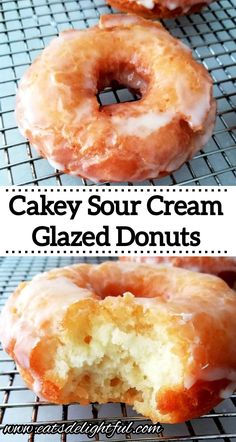 two glazed donuts on a cooling rack with the words, cakey sour cream glazed donuts