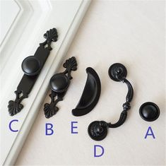 the door handles and knobs are labeled in blue letters that read bead, bead, bead