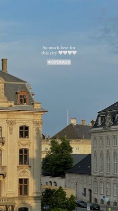 an old building with a clock tower in the background and a quote above it that reads so much love for this city