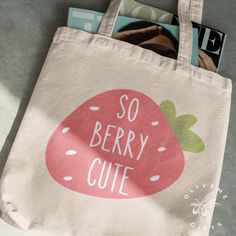 "We've designed a tote bag for our everyday hustlers. Cool, casual, yet stylish for when you're always on the go. This bag is being made and shipped out of Sunny California.  If you would like to customize your bag, please drop us a message!  Dimensions:  14\"W x 15\"L x 4\"D (base) 9\"H handle drop Materials: 12 oz./yd 100% heavy cotton canvas" Cute Tote Bags Paint, Tote Bag Diy Design, Custom Tote Bag Aesthetic, Cute Tote Bag Design, Strawberry Tote Bag, Diy Tote Bag Design, Painted Canvas Bags, Strawberry Bag, Handpainted Tote Bags