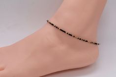 .  Beach Anklet, Beaded Anklet, Anklet Jewelry, Ankle Bracelet, Boho Anklet, Hippie Anklet, Gift For Her, Women's, Black Anklet, Gold Anklet Dainty anklet is made with 11/0 Czech black and gold seed beads with 2mm silver filled beads with a lobster clasp.  All items in my store are made buy me. Please send me a message if you want a custom order or need a size that is not listed in the drop down menu.  Size: Measure your anklet above the anklet bone with measuring tape. With that measurement add Black Round Beads Anklets For Beach, Black Beaded Anklets For Festival, Black Beaded Festival Anklets, Adjustable Black Ankle Strap Anklets, Adjustable Black Anklet With Tiny Beads, Elegant Black Beaded Anklets, Beaded Anklets With Ankle Strap As Gift, Beaded Anklets With Ankle Strap For Gifts, Adjustable Beaded Anklets With Ankle Strap