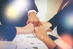 Business people showing fist bump after meeting