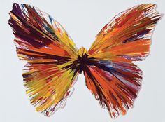 a colorful butterfly is flying through the air