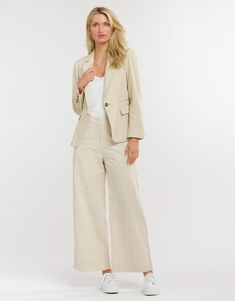 DESCRIPTION Elevate your wardrobe with the Portofino Linen Blazer in Natural by 365 Days Clothing. This versatile blazer seamlessly blends classic tailoring with the comfort of breathable linen. It features notched lapels, a single-button closure, and front flap pockets, offering a refined and practical addition to your collection. The natural linen fabric provides a relaxed yet polished look, perfect for any season and occasion. Pair the Portofino Linen Blazer with a crisp white shirt and tailored pants for a sophisticated office look, or wear it with jeans and a simple tee for a chic weekend look. Add a statement necklace and loafers to complete your stylish outfit. Still browsing? Discover our full range of women's clothing. FEATURES & FIT Notched lapels Single-button closure Front flap Sophisticated Office, Classic Tailoring, Natural Linen Fabric, Crisp White Shirt, Simple Tees, Stylish Outfit, Tailored Pants, Linen Blazer, 365 Days