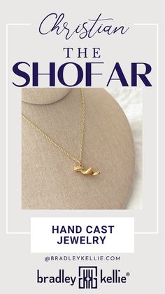 a gold necklace with the words, christian the shop air on it and an image of a