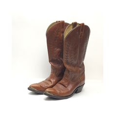 These vintage Bahma cowboy boots, made in Canada, are expertly crafted with genuine leather and feature a stylish stitched pattern along the sides and silver toe caps. These well-maintained boots are perfect for those with a narrow size 7 foot (even though they are marked a 7B) and also come with a pair of tarnished boot straps accented with shiny brass buckles. CONDITION: The boots are broken in and have some permanent creases in places as seen in the photos and some minor stress  tears along t Brown Cowboy Boots, Vintage Cowboy Boots, Boot Straps, Vintage Cowboy, Cowboy Western, Western Cowboy Boots, Brass Buckle, Girls Wear, Western Cowboy