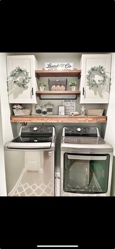 an image of a kitchen setting with stove and washer in the middle, white cabinets