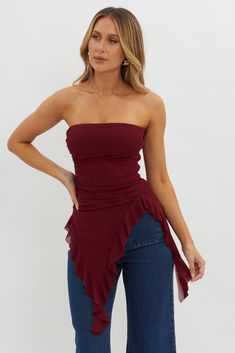 After Party Ruffle Trim Top Sangria Flirty Off-shoulder Tops For Party, Chic Ruched Tube Top For Party, Chic Party Tops With Ruffle Hem, Chic Tops With Ruffle Hem For Party, Ruched Bandeau Tube Top For Party, Trendy Strapless Tube Top For Date Night, Party Tube Top With Ruffles And Stretch, Stretch Ruffled Tube Top For Party, Chic Strapless Tube Top With Ruffles