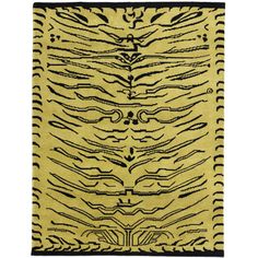 a rug with black and yellow designs on it