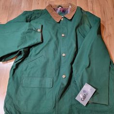 Vintage California Green Men's Collared Long Sleeve Button Up Coat Size 2xl. Good Pre-Owned Condition. Please See The Picture For Reference On The Conditions. Classic Green Utility Jacket With Buttons, Green Cotton Outerwear With Snap Buttons, Casual Cotton Sport Coat For Hunting, Classic Green Button-up Utility Jacket, Classic Green Outerwear With Buttoned Pockets, Casual Long Sleeve Hunting Sport Coat, Casual Long Sleeve Sport Coat For Hunting, Classic Green Utility Jacket For Outdoor, Cotton Hunting Jacket With Button Closure