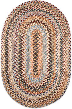 the oval rug is made from multicolored braids and has an oval shape