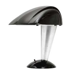 a black and silver desk lamp on a white background