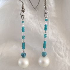 Beaded Turquoise Drop Pearl Hand Crafted Pierced Earrings. Great Gift Idea! Turquoise And Clear Glass Beads Turquoise Round Beads Vintage Costume Off-White Pearl Beads Silver Toned Pierced Earring Hooks Lightweight Fast Shipper Made In Usa Boho Chic Fashion Handmade Jewelry Unique Boutique Essential Shabby Chic Pearlcore Victorian Regencycore Accessory Turquoise Earrings With Silver Round Beads, Turquoise Silver Beaded Dangle Earrings, Elegant Turquoise Beaded Dangling Earrings, Turquoise Beaded Earrings With Silver Beads As Gift, Elegant Turquoise Beaded Earrings Nickel-free, Elegant Turquoise Beaded Earrings Nickel Free, Diy Earrings Easy Beads, Simple Bead Earrings, Diy Beaded Earrings