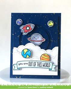 a card with an image of planets and the words you are out of this world