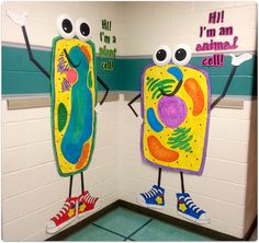 two paper cutouts depicting cell phones with eyes and legs