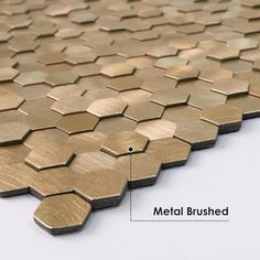 an image of metal brushed hexagon tiles with different sizes and colors to choose from