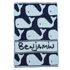 a knitted afghan with the words bejejamin on it and an image of two