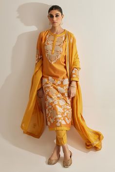 Buy Yellow Silk Chanderi Embroidered Applique Round Kurta Set For Women by Shyam Narayan Prasad Online at Aza Fashions. Slub Silk Sets With Resham Embroidery For Puja, Unstitched Yellow Salwar Kameez For Puja, Fitted Yellow Salwar Kameez With Floral Embroidery, Festive Orange Kurta With Floral Embroidery, Festive Mustard Salwar Kameez With Dupatta, Festive Mustard Set With Dupatta, Semi-stitched Yellow Kurta With Floral Embroidery, Resham Embroidered Anarkali Set For Puja, Festive Mustard Kurta With Resham Embroidery