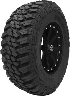 an all terrain tire on a black wheel