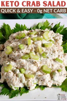 a close up of a plate of food with celery on it and the words keto crab salad