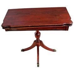 a wooden table with two legs and a top on it's end, sitting against a white background