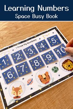 the learning numbers space busy book for kids to practice counting and number recognition with their hands