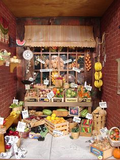 a display in a store filled with lots of fruits and vegetables