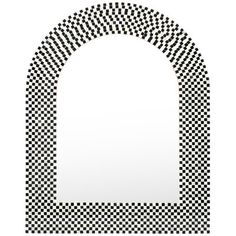 an arched window with black and white checkered pattern