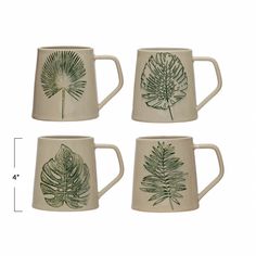 four mugs with different designs on them, one is green and the other is white