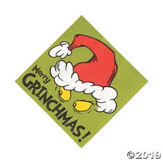 a green napkin with an image of a santa hat on it and the words, merry grinmas