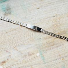 Sterling silver curb ID bracelet. Lenght: 20 cm. All items in our shop will be shipped in a gift box. All items in this shop are hand made by Luxoro Design team. Please take a look at other items in our store: https://www.etsy.com/shop/LuxoroAmberDesign?ref=seller-platform-mcnav Thank you for visiting our store. Adjustable Silver Bracelet With Curb Chain, Cuban Link Chain Bracelet Engraved Gift, Engraved Cuban Link Bracelets As Gift, Silver Jubilee Name Bracelet, Silver Curb Chain Bracelets For Gift, Silver Curb Chain Bracelets As Gifts, Classic Silver Name Bracelet With Bracelet Strap, Classic Silver Name Bracelet With Strap, Sterling Silver Curb Chain Bracelet Gift