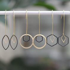 Dainty geometric, drop earrings in a mix of matte gold and matte black equals simple, elegant earrings with a smidge of edge. Pair them with anything black, especially your evening looks. ⭐   Want to get 20% off your first order? Join the Style Club and get a coupon for 20% off sent to your inbox! https://bit.ly/ohsoetsycoupon.⭐ HYPOALLERGENIC MINIMALIST JEWELRY: Enjoy beautiful, hypoallergenic, minimalist jewelry without compromising your sensitive skin. Oh, So Fitting's geometric jewelry is made with nickel-free hooks and chains, so you can rest easy!  SIZING: - Oval = 5.3 cm - Circle = 5.2 cm - Hexagon = 5.1 cm GOOD TO KNOW: - They are lightweight with gold plated, hypoallergenic hooks. - The price is for a single pair of earrings CARE: Water and chemicals don't play well with metals, s Minimalist Jewelry Necklaces, Metalsmith Earrings, Geometry Fashion, Simple Elegant Earrings, Matte Gold Earrings, Minimalistic Jewelry, Metal Pendant Necklace, Metal Smithing, Earring Wedding